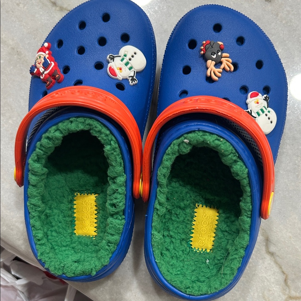Blue and Orange CROCS with green Sherpa
